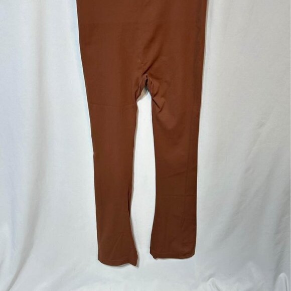 Woman’s one piece jumpsuit with flare bottoms. Gorgeous square neckline, padded - Picture 6 of 10